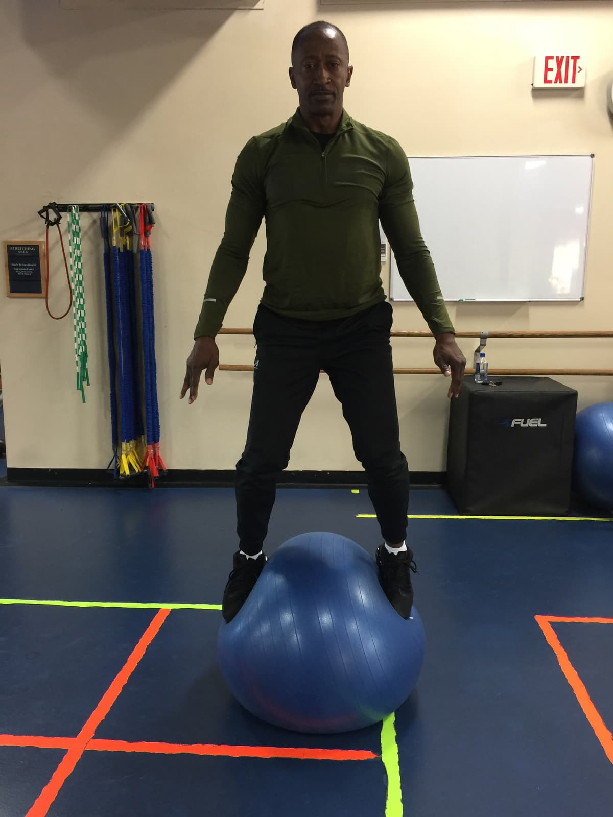 Standing on a stabilizer ball